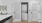 laundry closet with stacked washer/dryer units