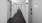 carpeted building hallways with recessed lighting