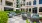 umbrella shaded tables and chairs in courtyard