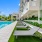 lounge chairs beside pool