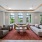 couches and tables in clubhouse with large windows