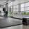 padded mat next to free weights