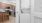 stacked washer/dryer units in closet