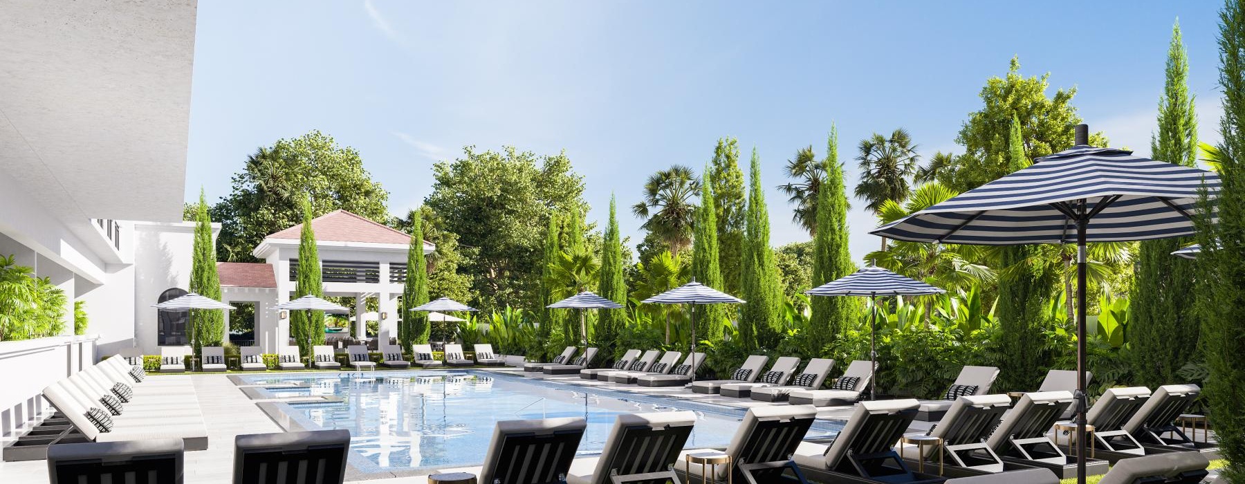 a pool with chairs around it