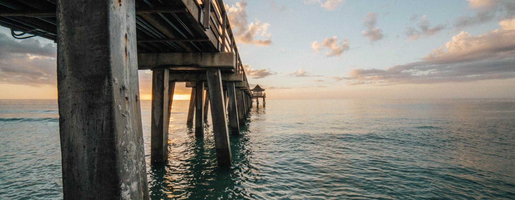 a wooden dock over water