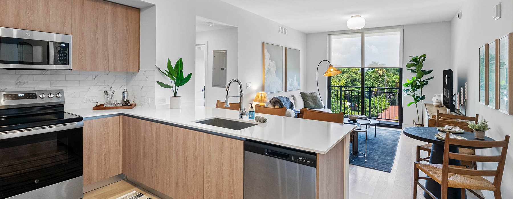 a kitchen with white countertops